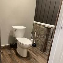 Second restroom with matching stone accents